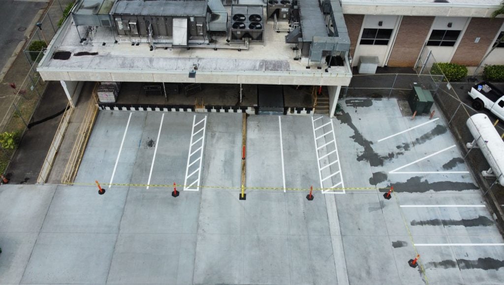 USPS parking lot with freshly painted line markings