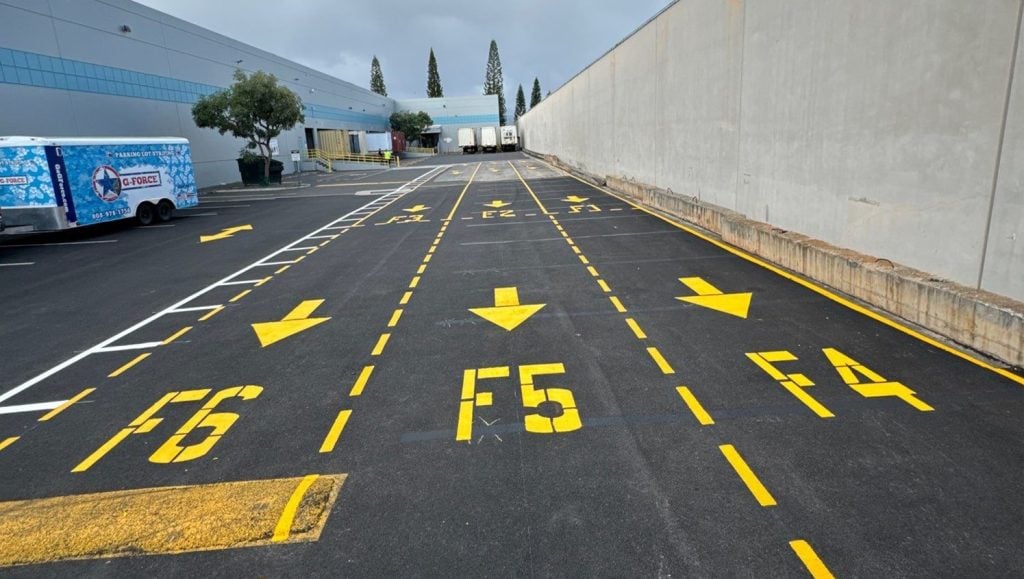 close-up of trucks and freshly painted line marking