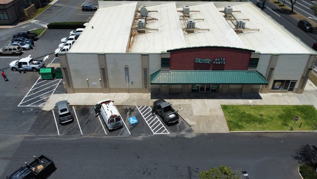 close-up of freshly painted white lines for O'Reilly Auto Parts parking lot