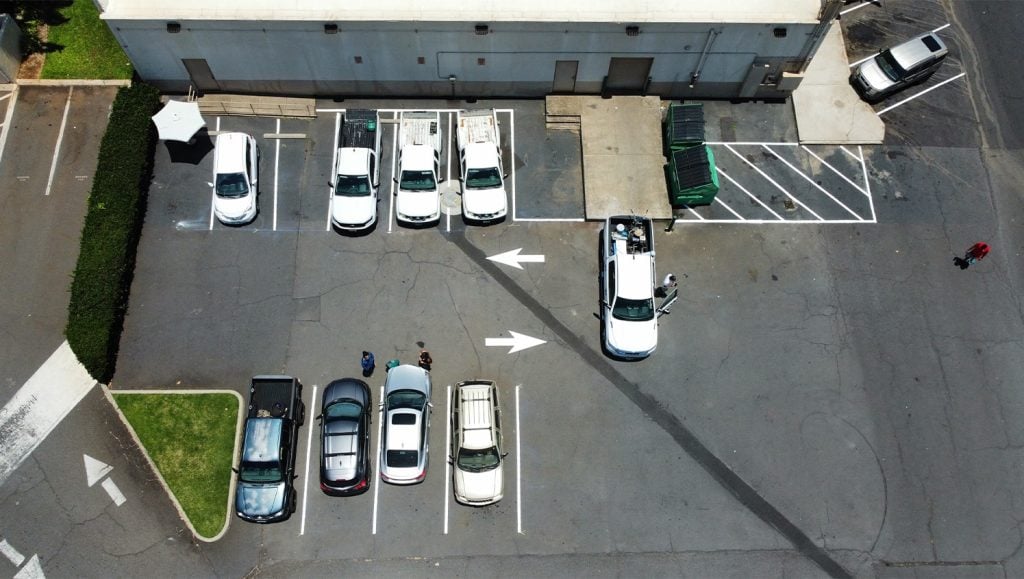 parking spots with freshly painted line markings for O'Reilly Auto Parts