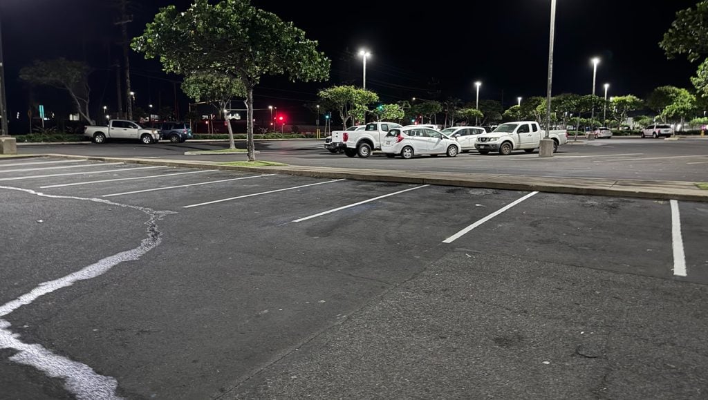 aerial view of O'Reilly Auto Parts parking lot with freshly paitned ada compliance parking spots