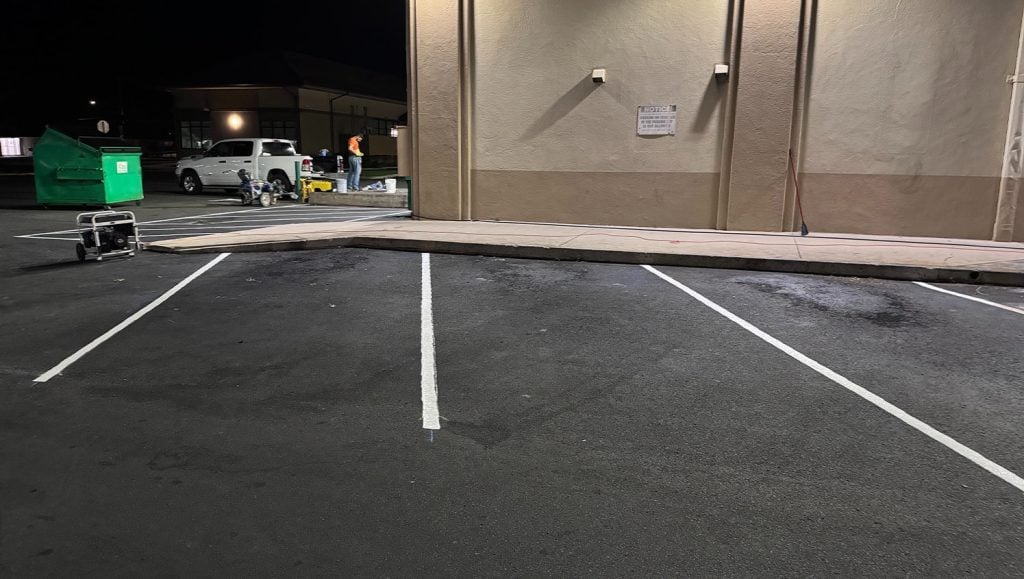 freshly painted line marking for O'Reilly Auto Parts parking lot