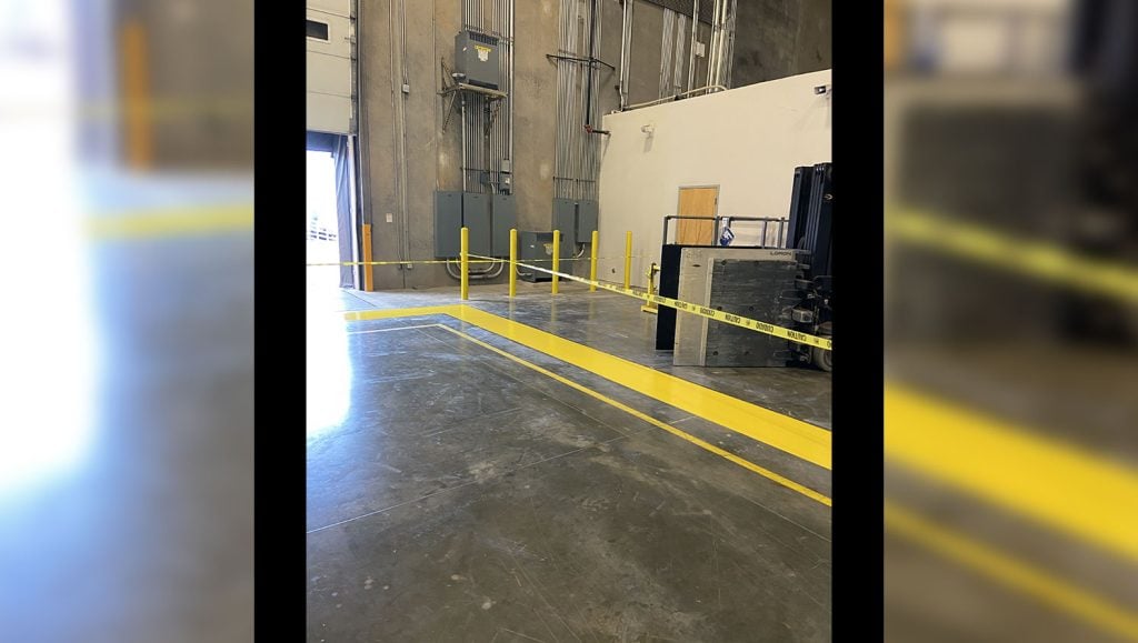 safety yellow border floor markings in warehouse