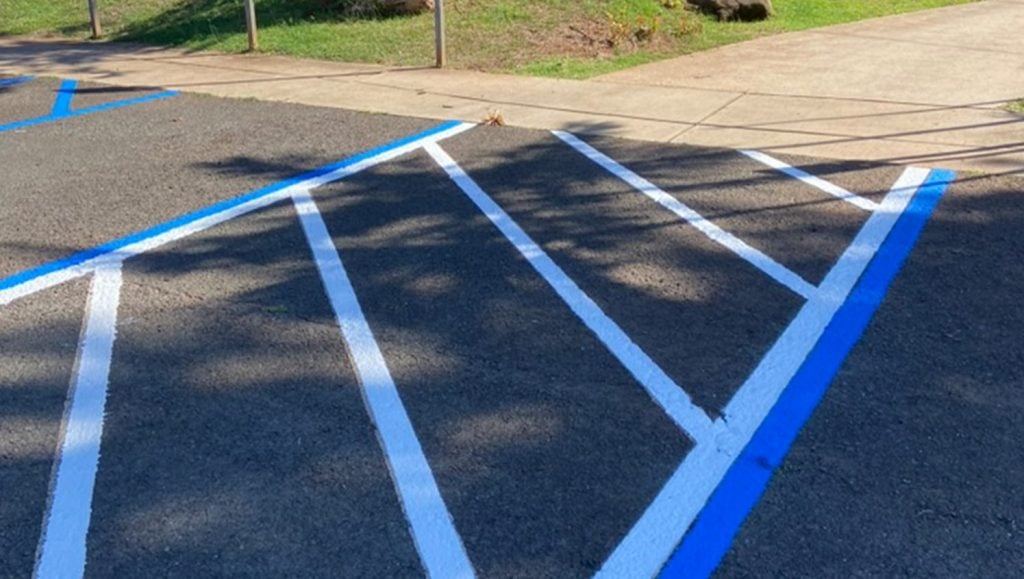 freshly painted line markings for Coral Creek Golf Course parking lot
