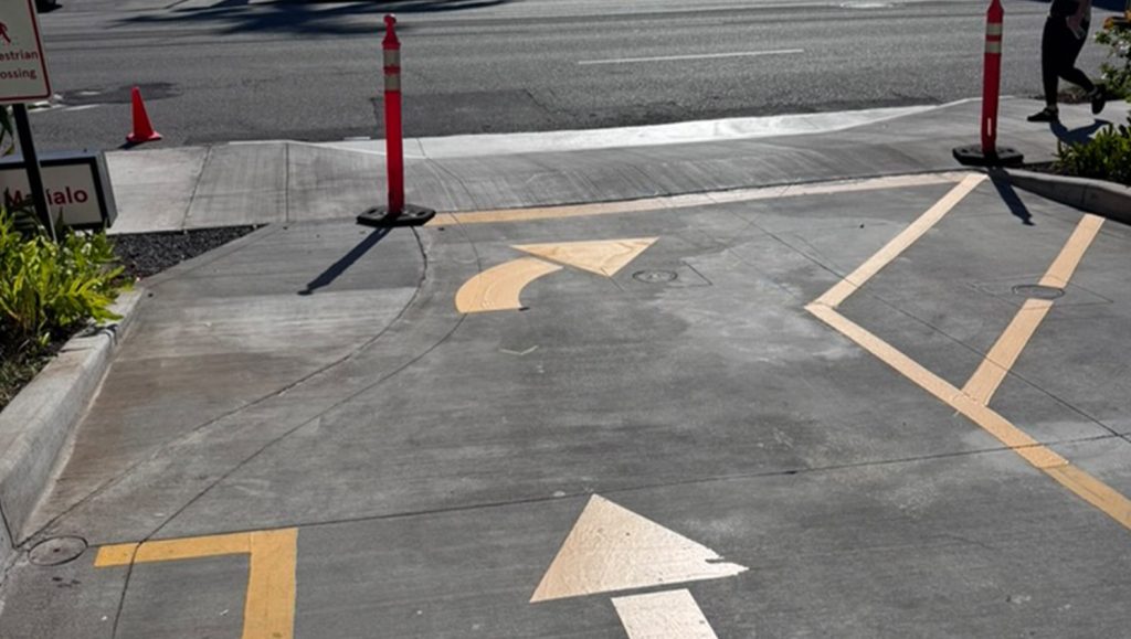 arrows freshly painted for Chick Fil A Makiki parking lot