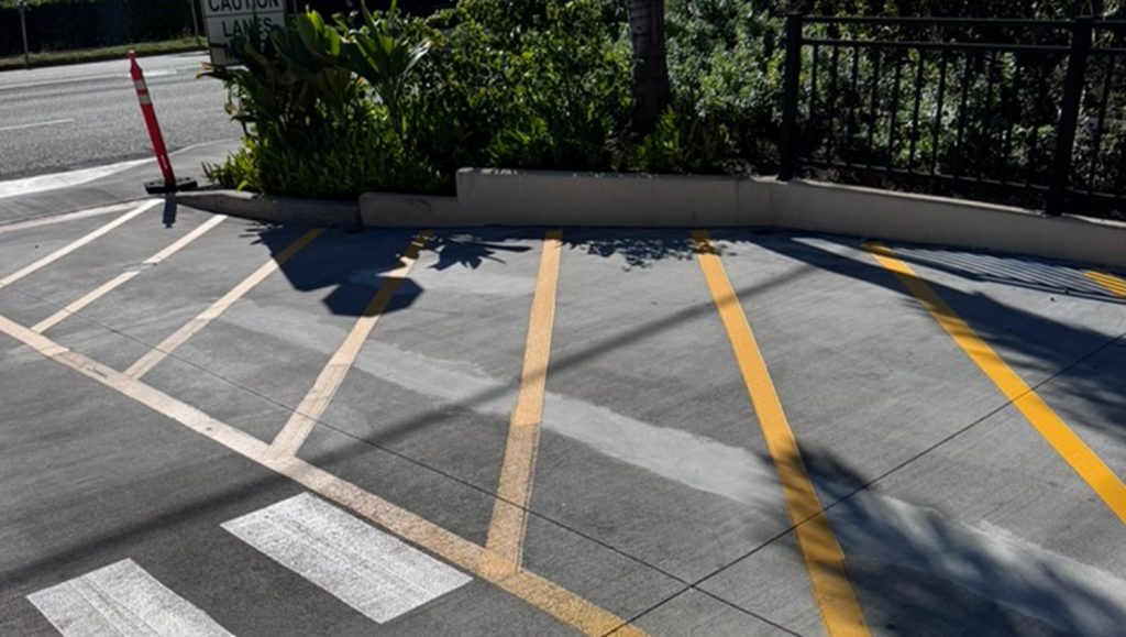 crosswalk freshly painted for Chick Fil A Makiki parking lot