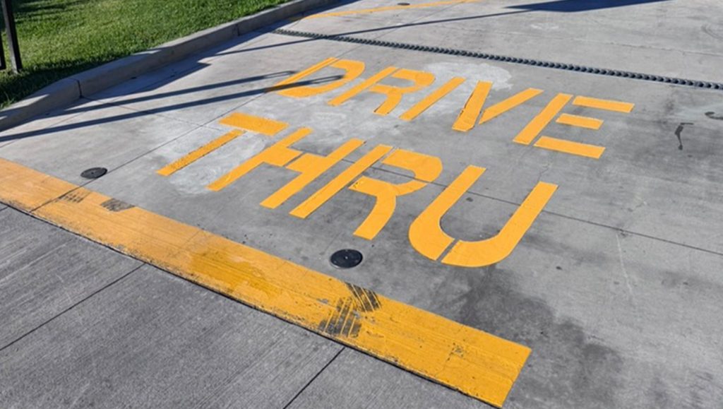 drive thru markings frehly painted for Chick Fil A Makiki