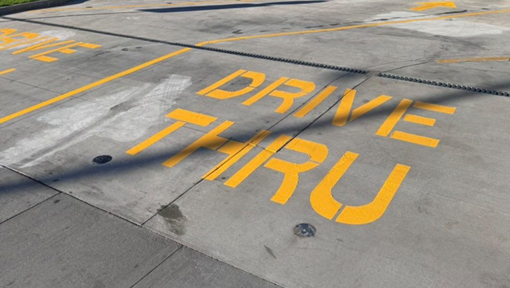 drive thru markings freshly painted for Chick Fil A Makiki