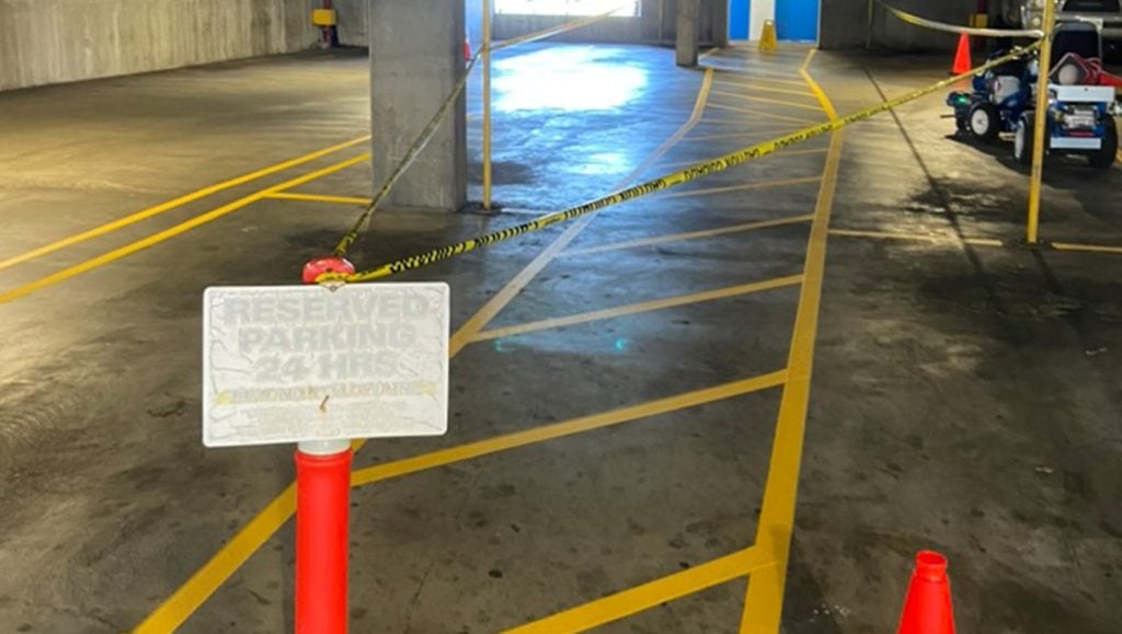 close-up of freshly painted line markings for Diamond Parking