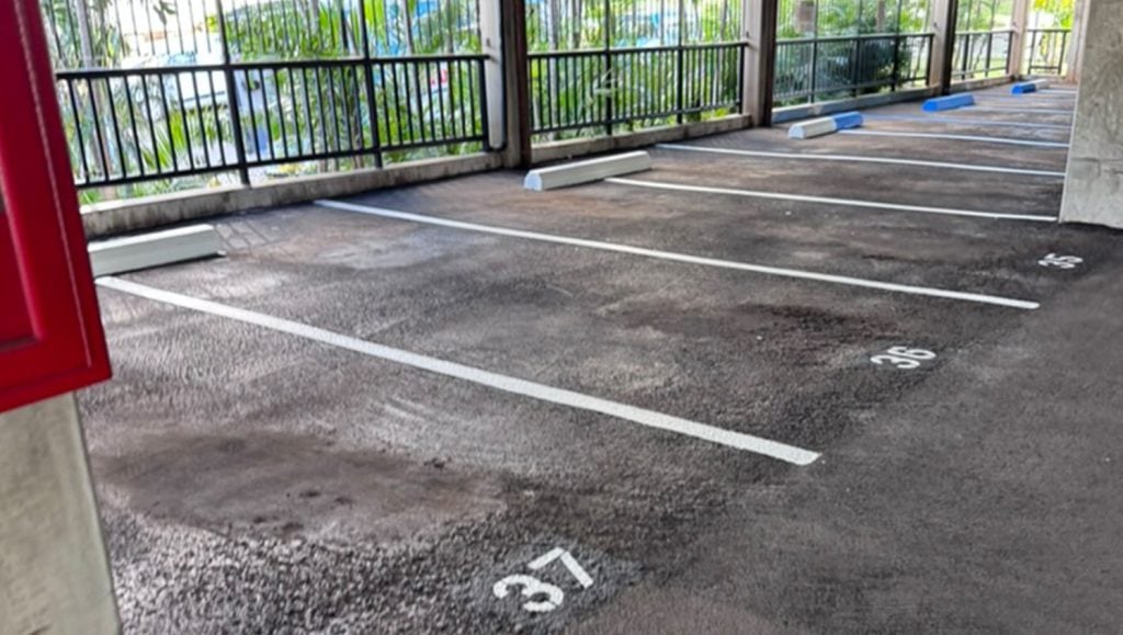 freshly painted parking spots for Parkland Gardens Condominium parking lot