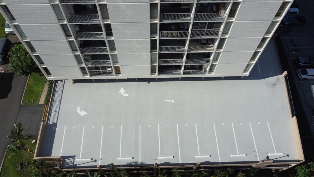 aerial view of Parkland Gardens Condominium parking lot freshly painted