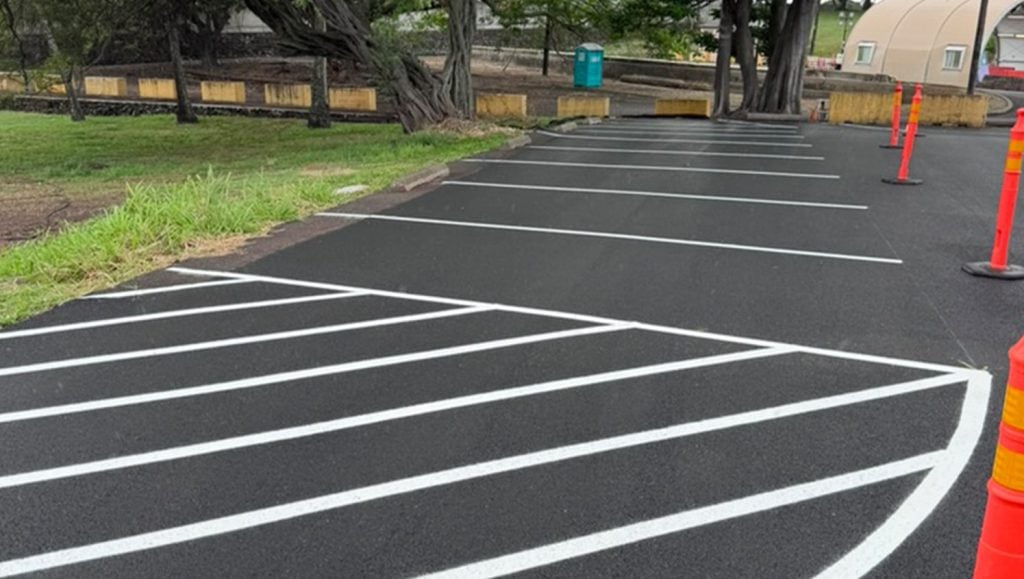 freshly painted line striping for The Core Group Construction parking lot