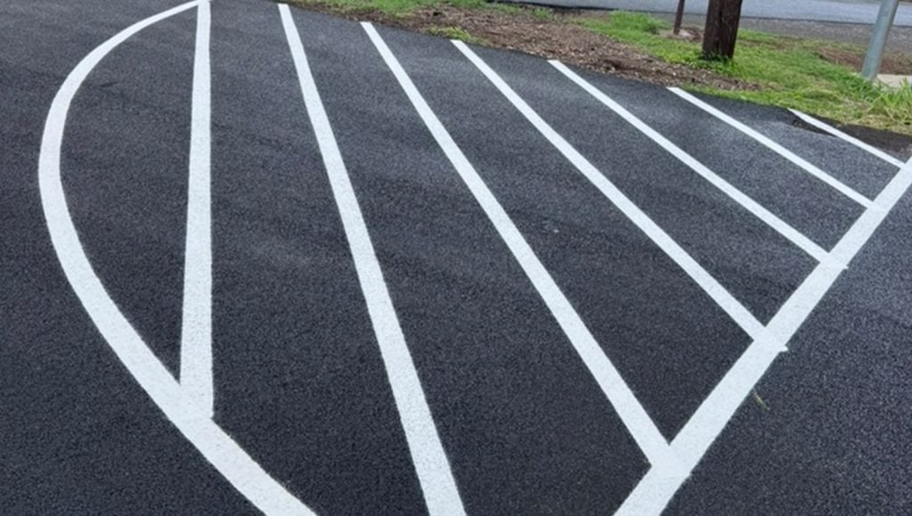 line markings freshly painted for The Core Group Construction parking lot