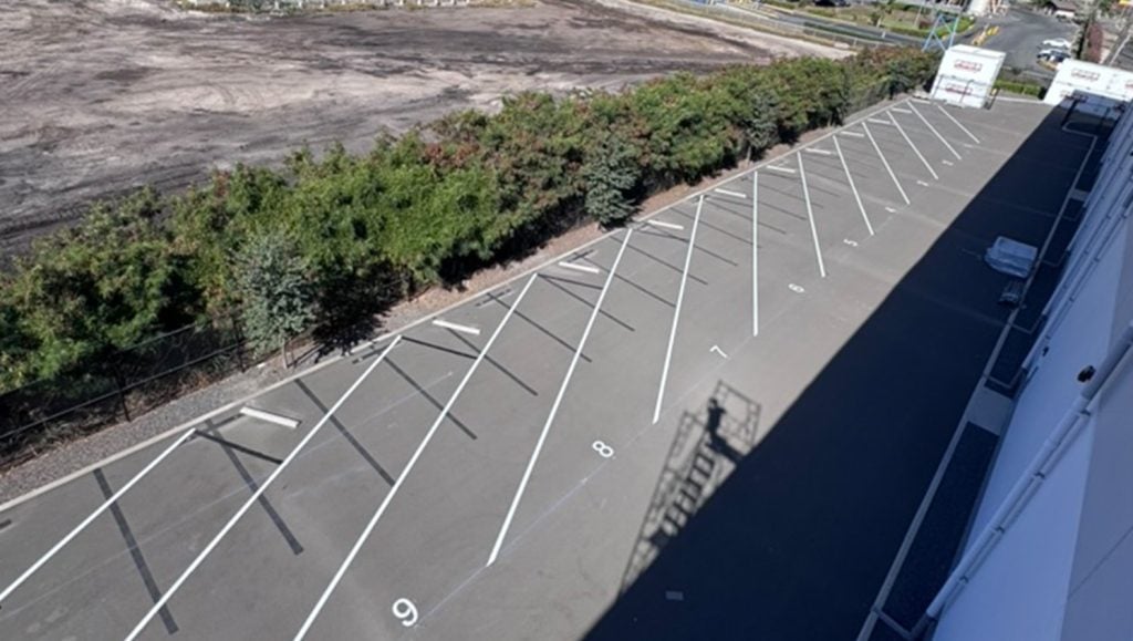 aerial view of HDC Properties LLC parking lot freshly painted