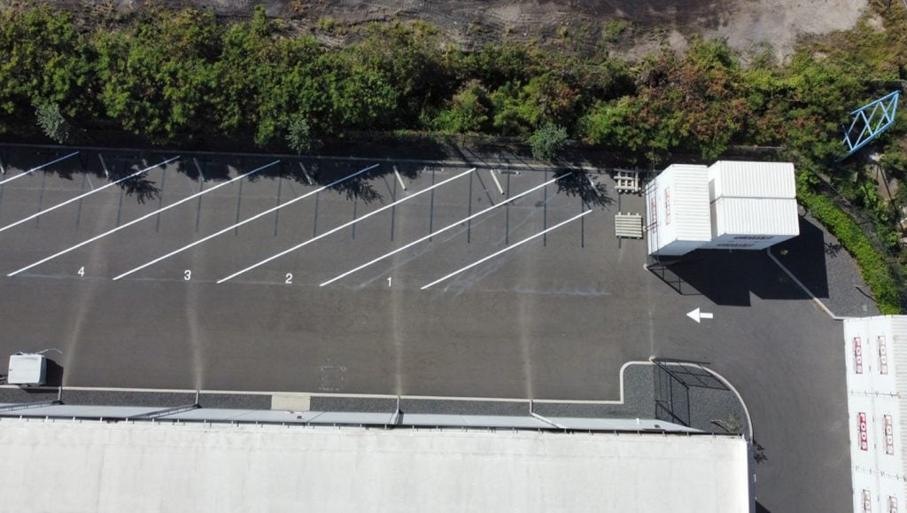 freshly painted parking spots for HDC Properties LLC aerial view