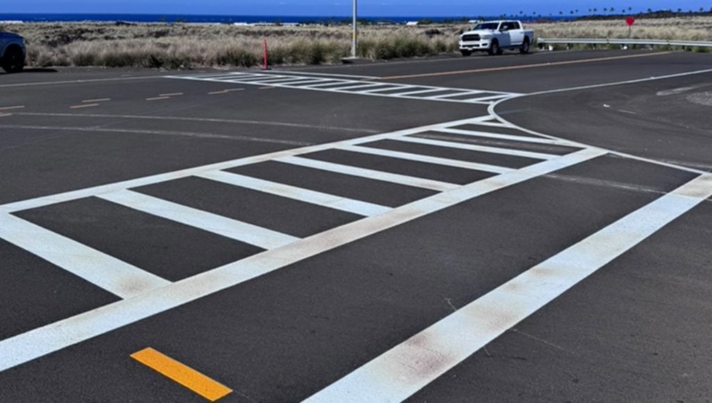 crosswalk freshly painted for PC Construction parking lot