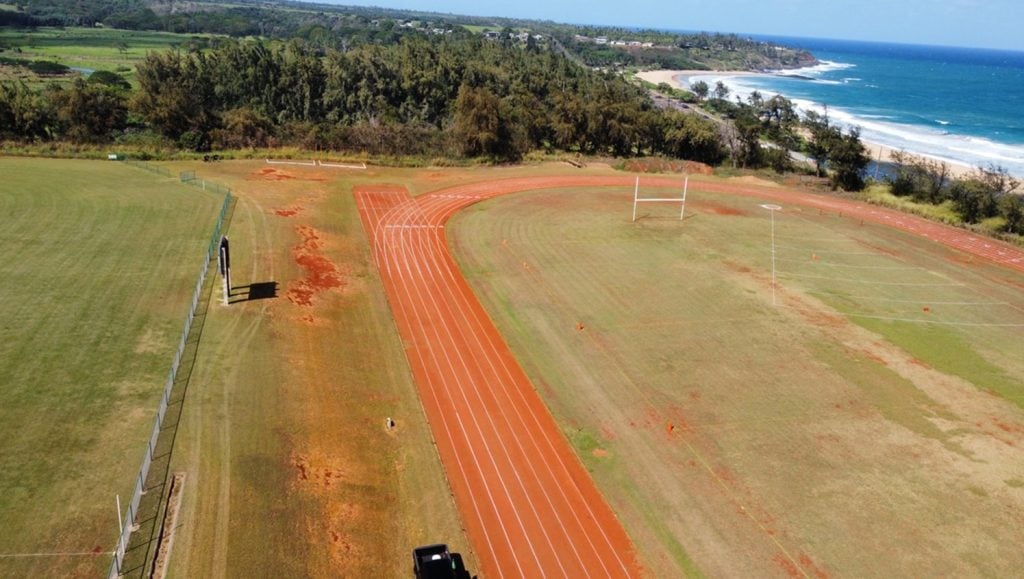 aerial view of track and field freshly painted