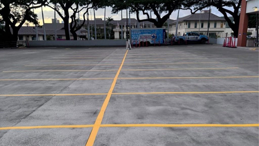 close-up of parking spots freshly painted for Kapiolani Women and Children's Hospital parking lot