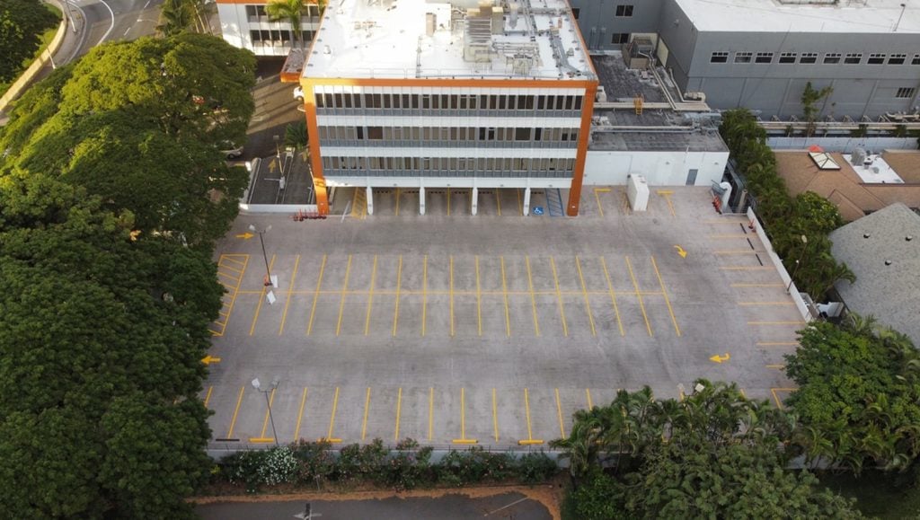 aerial view of Kapiolani Women and Children's Hospital parking lot freshly painted