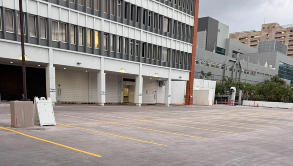 close-up of parking spots freshly painted for Kapiolani Women and Children's Hospital parking lot