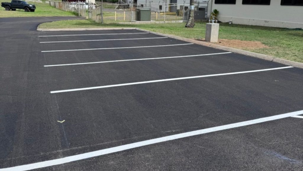 freshly painted parking spot for TCG Construction
