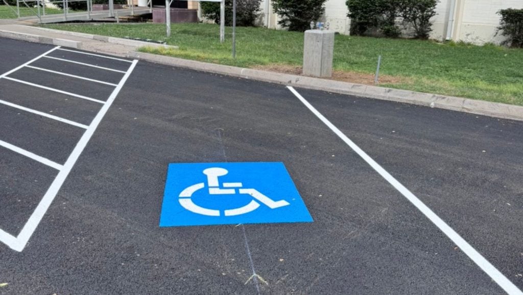 close-up of ada compliance parking spot for TCG Construction parking lot
