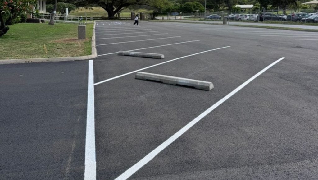 close-up of line markings for TCG Construction parking lot