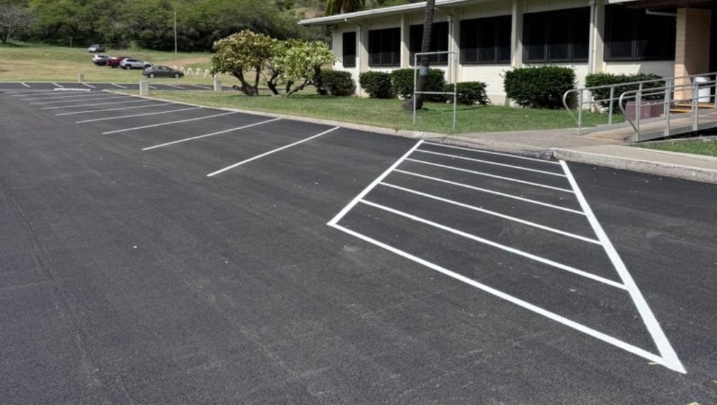 freshly painted line markings for TCG Construction parking lot