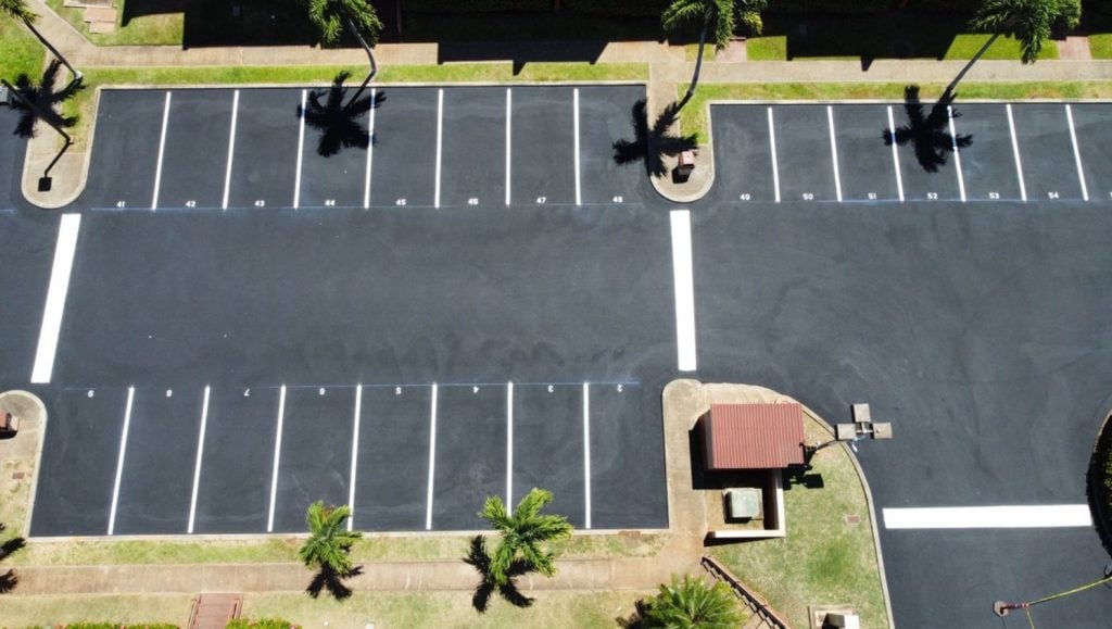 aerial view of Acacia Apartments parking lot freshly painted