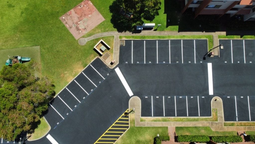 aerial view of Acacia Apartments parking lot freshly painted