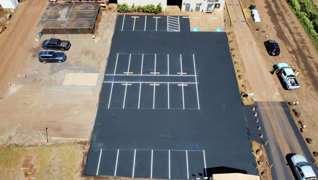 Hawaiian Earth Products parking lot freshly painted aerial view