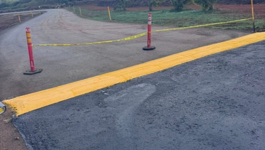 close-up of freshly painted line markings for Hawaiian Earth Products