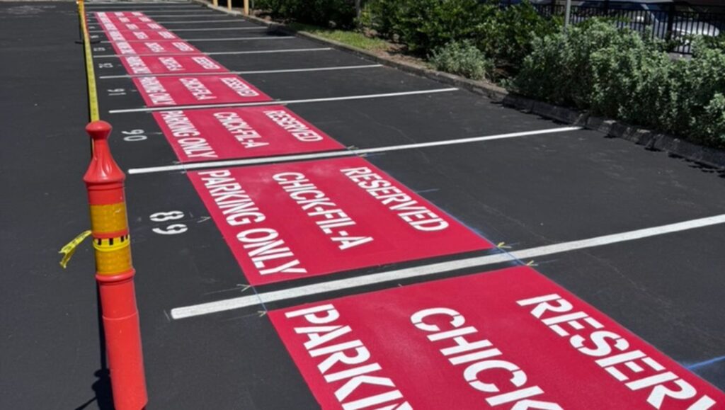 freshly painted parking spots for Chick Fil-A Makiki parking lot