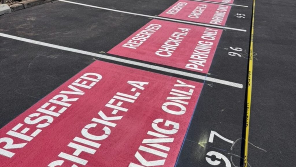 red line markings freshly painted for Chick Fil-A Makiki parking lot