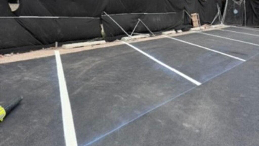 parking spots freshly painted for Denny's Waikiki parking lot