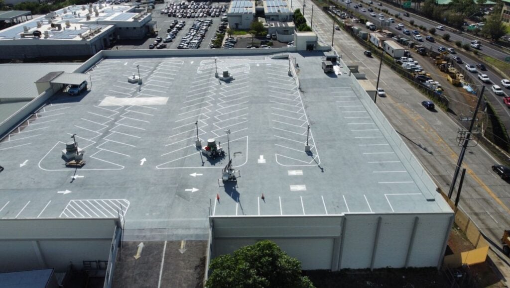 Honolulu Freight Company rooftop freshly painted aerial view