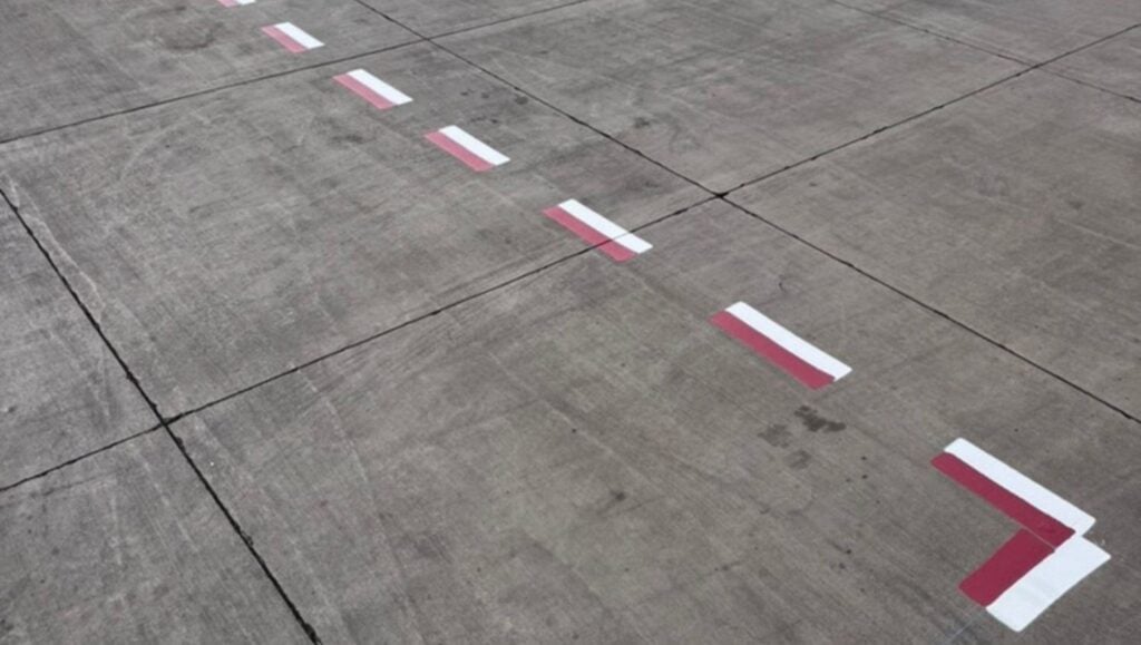 red and white line striping for Kahului Airport Ramps