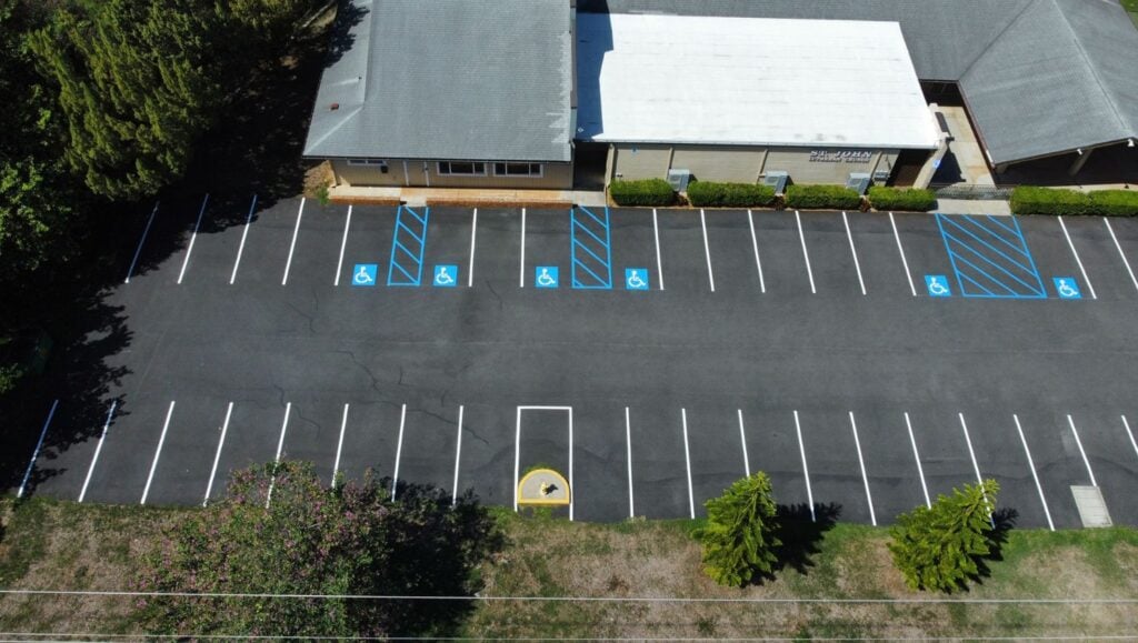 parking spots freshly painted for St. John Lutheran Church parking lot aerial view