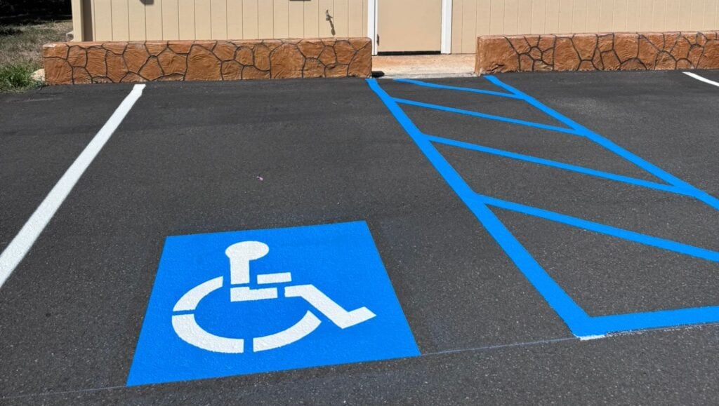 close-up of ada compliance parking spot freshly painted for St. John Lutheran Church