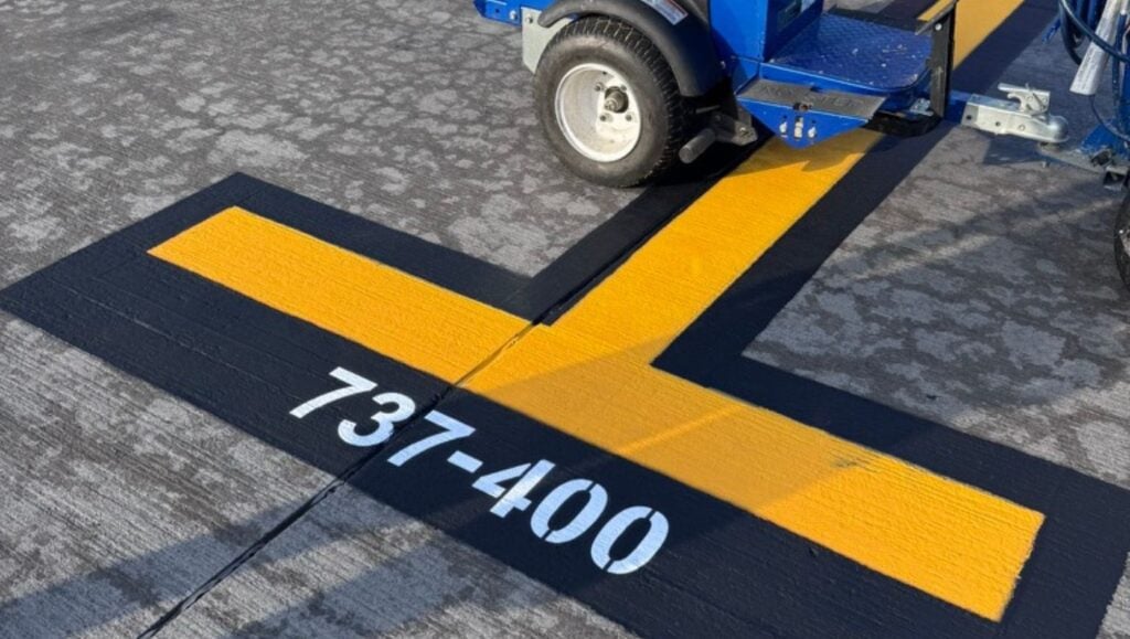 close-up of line marking freshly painted for Traffic Associated Marking Systems parking lot