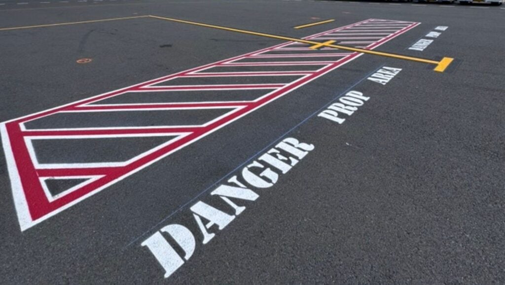 "danger" freshly painted for Traffic Associated Marking Systems parking lot