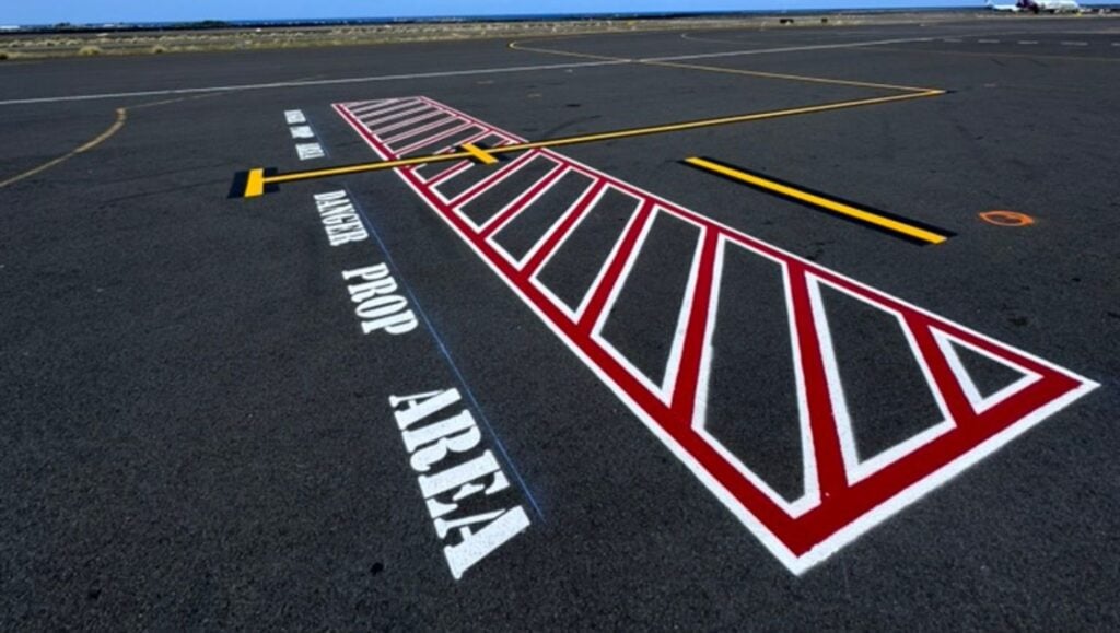 line striping freshly painted for Traffic Associated Marking Systems parking lot