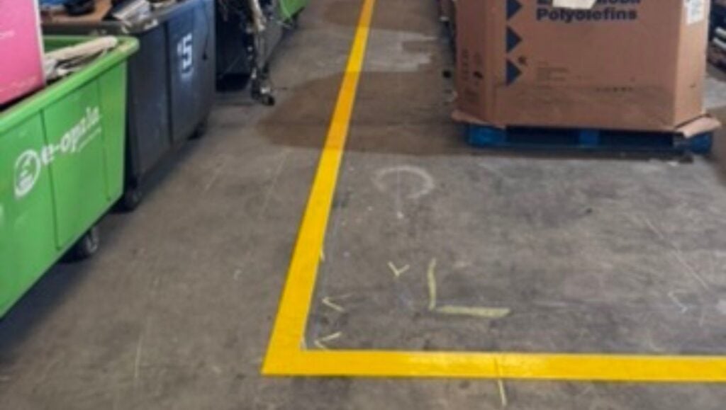 yellow line marking freshly painted for E-Opala warehouse