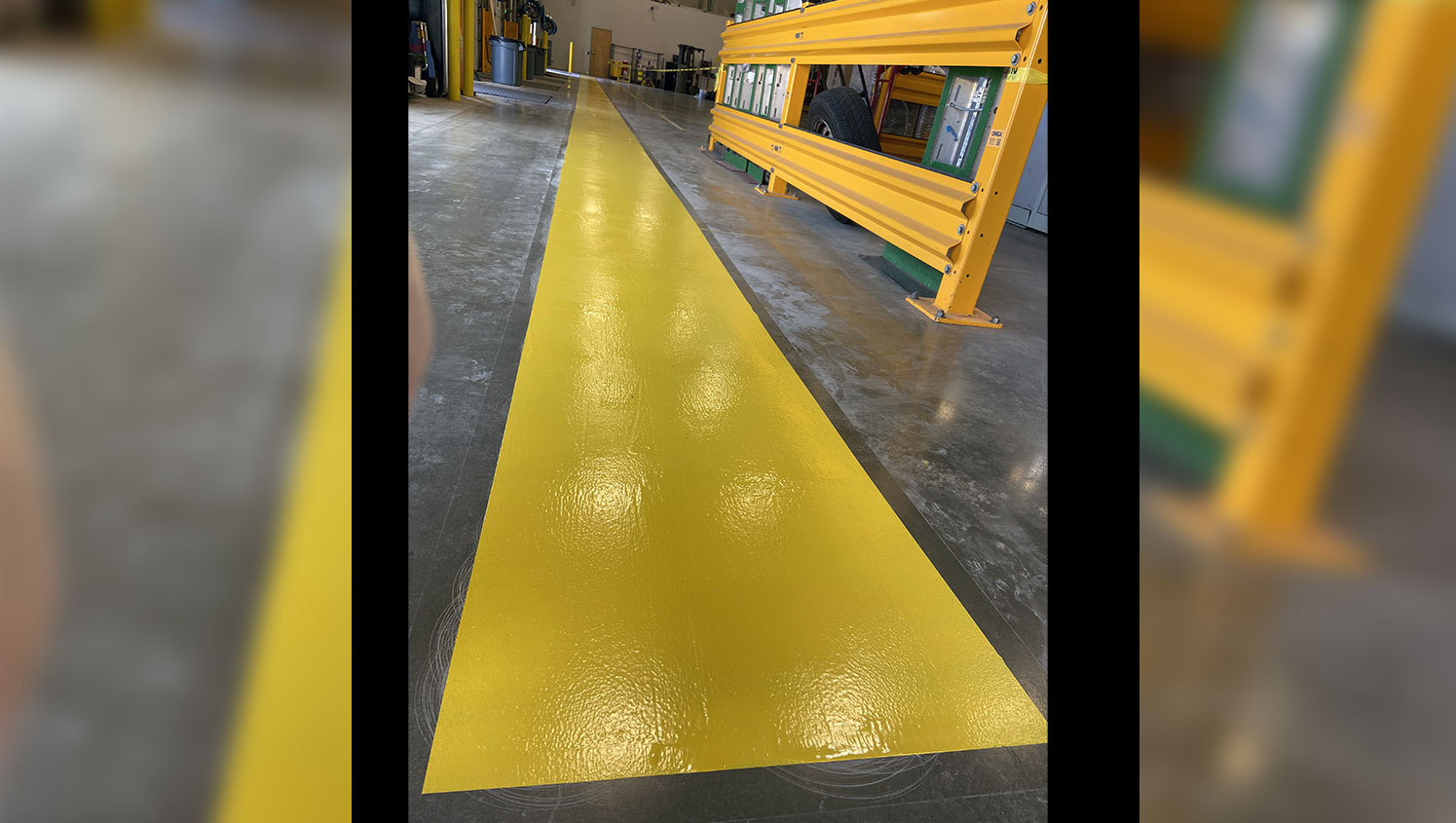 2-foot wide safety yellow border in warehouse