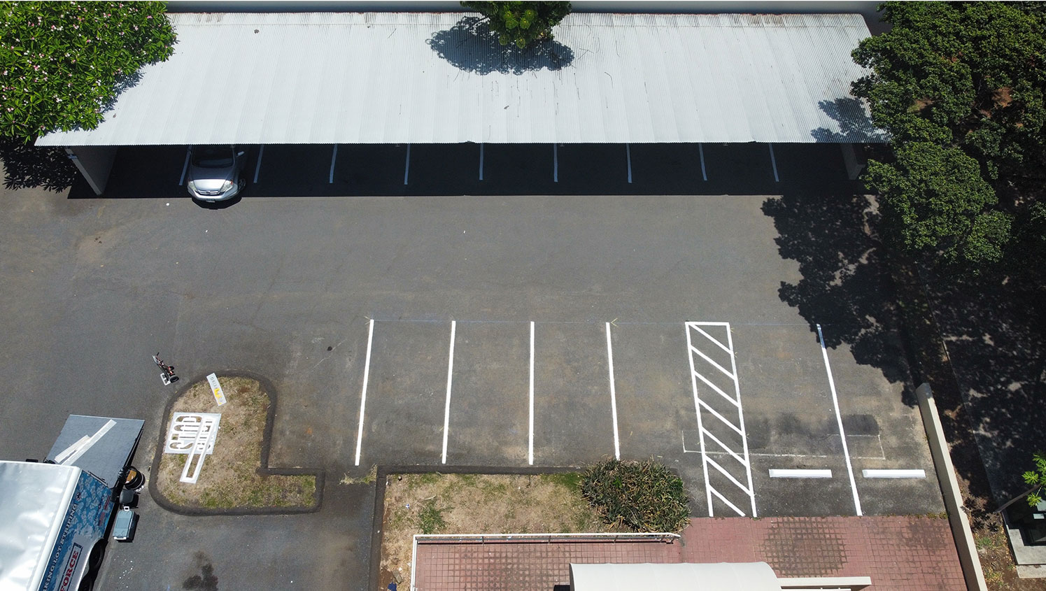 aerial view of parking lot line striping in honolulu