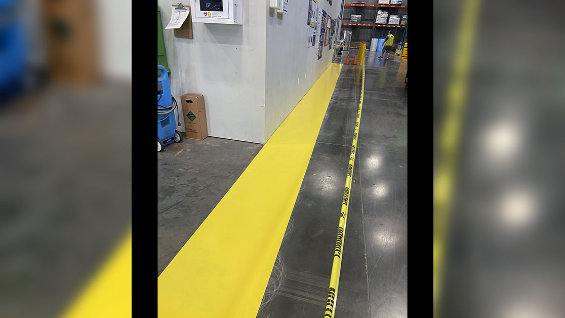 safety yellow border floor markings in warehouse