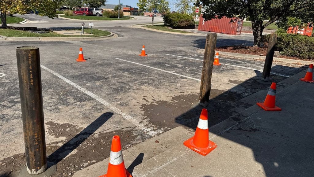 bollard installation for Natural Grocers parking lot