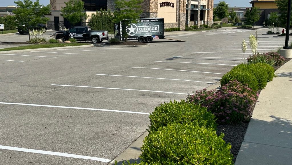 re-striped parking lot stalls in front of restaurant