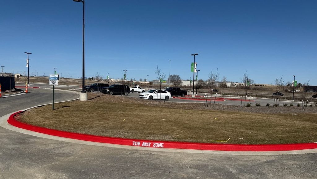 freshly painted line striping for AdventHealth Sports Park at Bluhawk parking lot