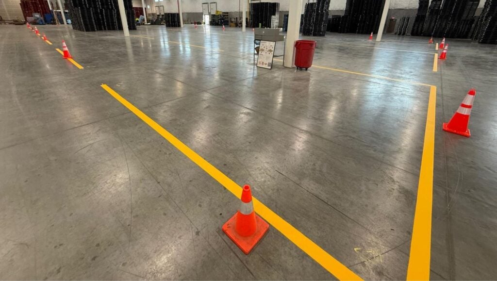 close-up of yellow markings freshly painted for Propak warehouse